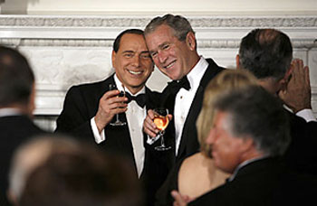 Mr. Berlusconi goes to Dallas